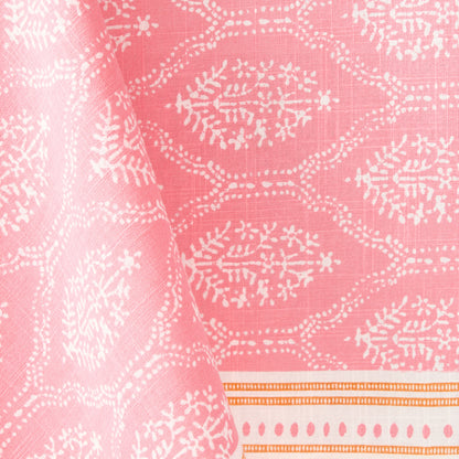 Pink Jaali printed cotton slub tablecloth with white floral patterns and an orange border.