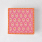 Peter Dunham + Hudson Grace Pink Janpath cocktail napkins with orange border and paisley pattern.
