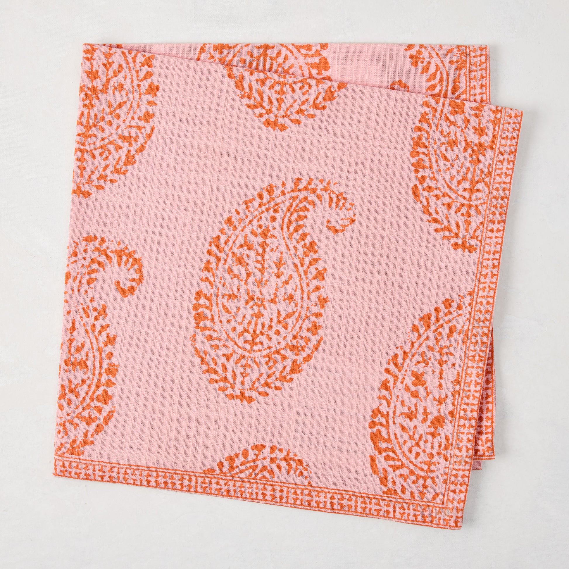Peter Dunham + Hudson Grace Pink Kashmir Paisley Printed Napkin, orange block print design.