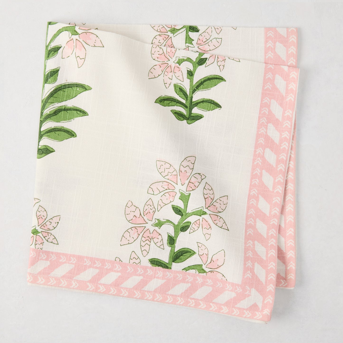 Peter Dunham + Hudson Grace Pink Shani Floral Printed Napkin, 100% cotton slub, folded.
