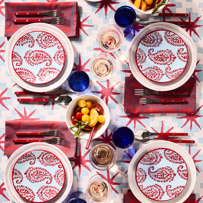 Peter Dunham + Hudson Grace Red Fez hand-painted dinner plates with red paisley pattern on a blue background.