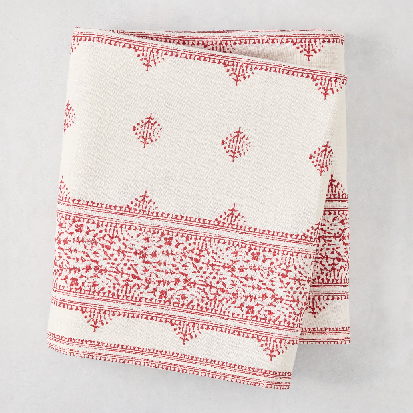 Peter Dunham + Hudson Grace Red Fez Stripe Printed Tablecloth, 100% cotton slub, folded.