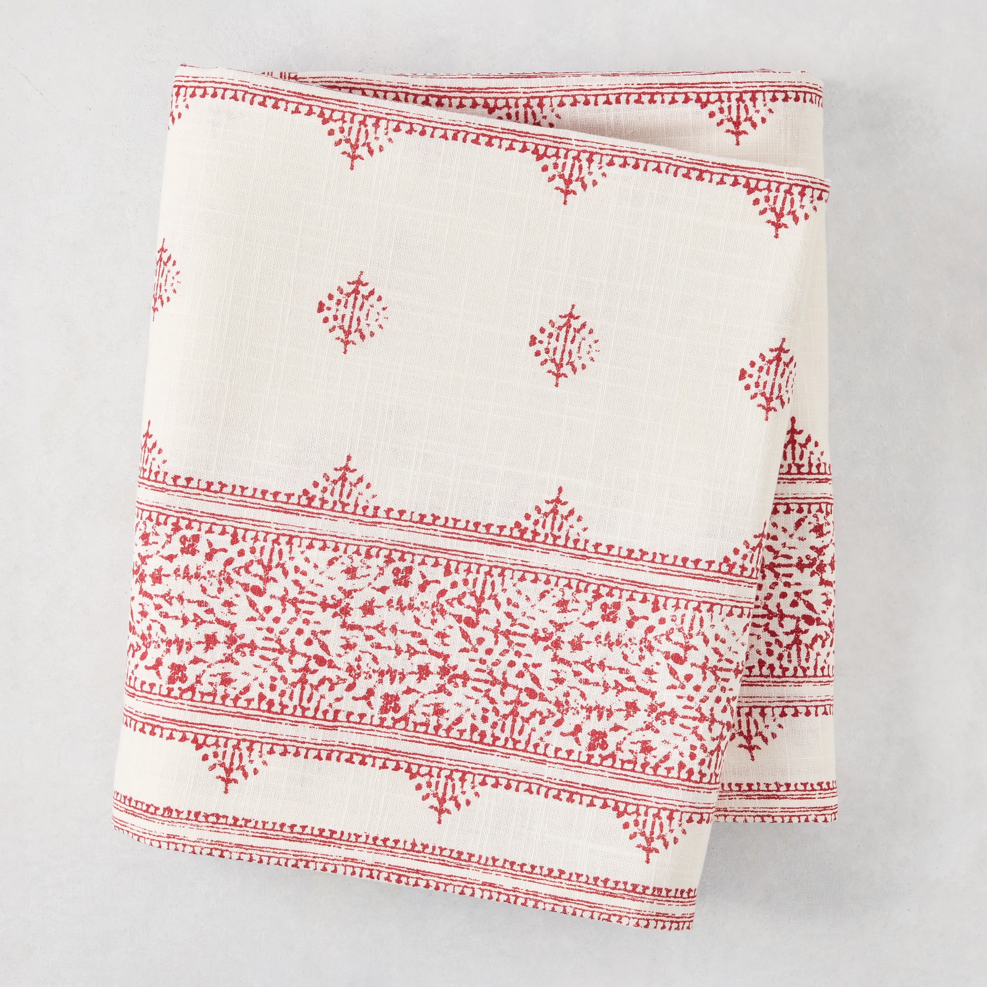 Peter Dunham + Hudson Grace Red Fez Stripe Printed Tablecloth, 100% cotton slub, folded.