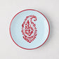 Peter Dunham + Hudson Grace Red Kashmir Paisley appetizer plate, hand-painted light blue ceramic with red trim.