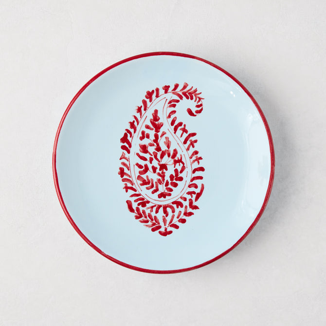 Peter Dunham + Hudson Grace Red Kashmir Paisley appetizer plate, hand-painted light blue ceramic with red trim.