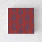 Peter Dunham + Hudson Grace Kashmir cocktail napkins, red with blue paisley pattern.