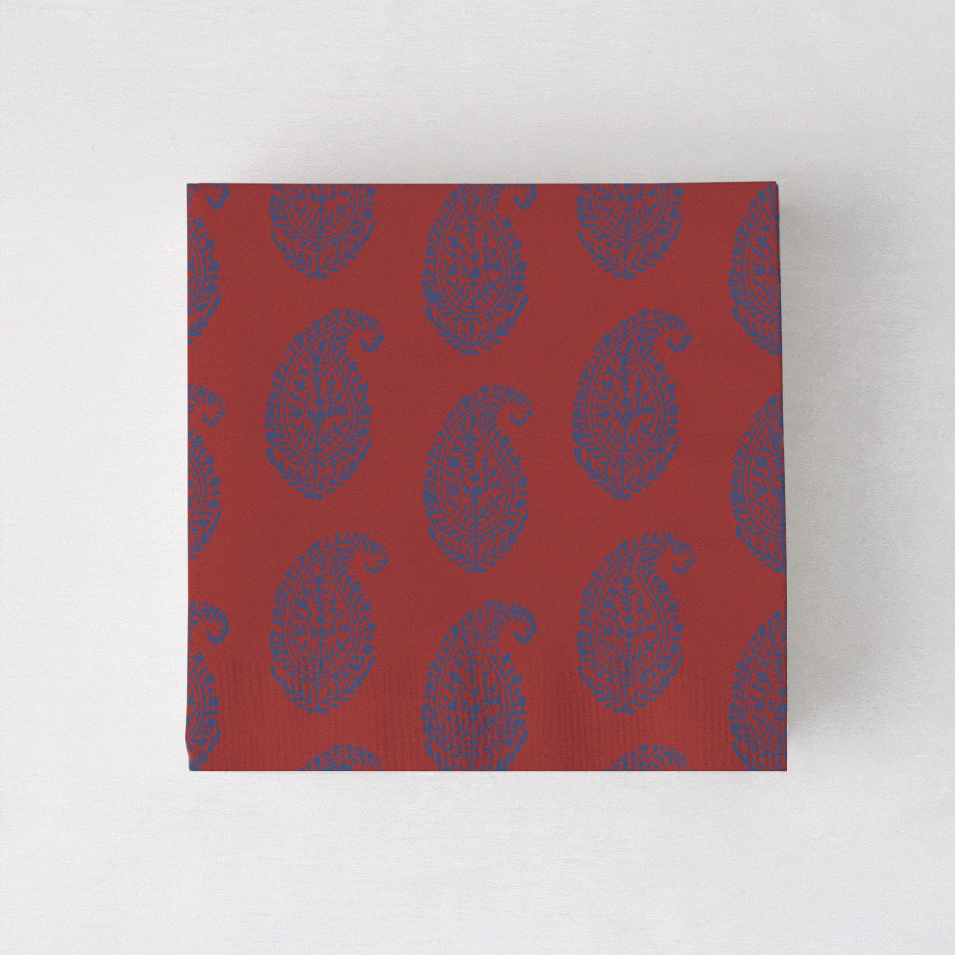 Peter Dunham + Hudson Grace Kashmir cocktail napkins, red with blue paisley pattern.