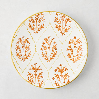 Peter Dunham + Hudson Grace Spice Orange Hand-Painted Jaali Salad Plate with green border.