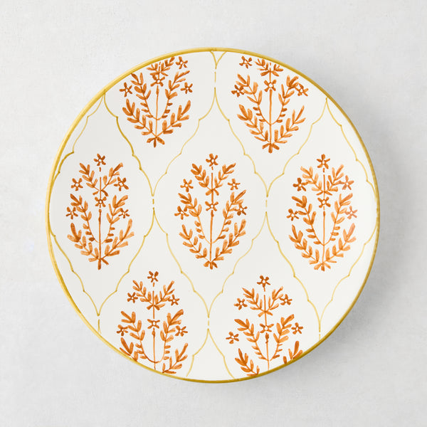 Peter Dunham + Hudson Grace Spice Orange Hand-Painted Jaali Salad Plate with green border.