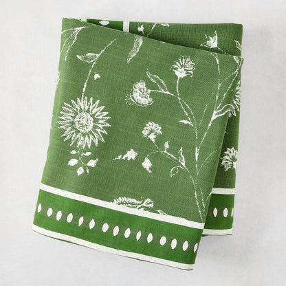 Peter Dunham x Hudson Grace olive green Indian chintz floral printed cotton tablecloth, folded.