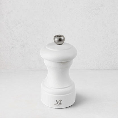 Peugeot Bistro 4" matte white wooden pepper mill with silver knob and logo.