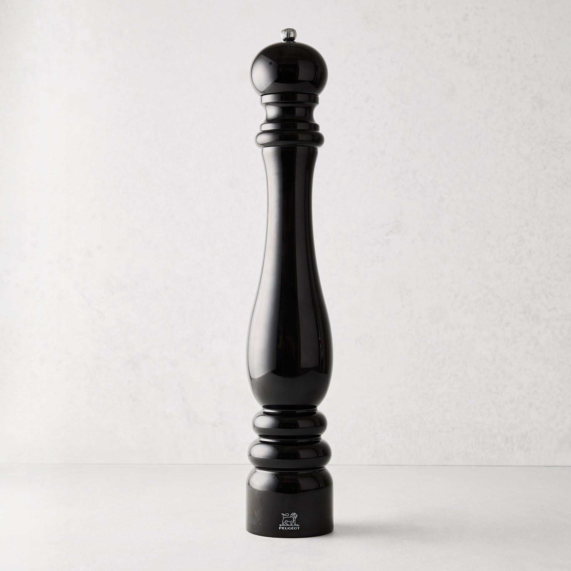 Peugeot Paris 20-inch extra large pepper mill in glossy black lacquered beechwood with a stainless steel top knob.
