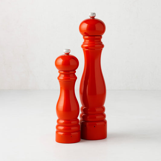 Peugeot Paris Exclusive "HG International Orange" beechwood salt and pepper mills set.