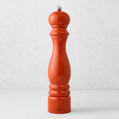 Peugeot Paris Exclusive 12" pepper mill in International Orange beechwood with a silver finial.