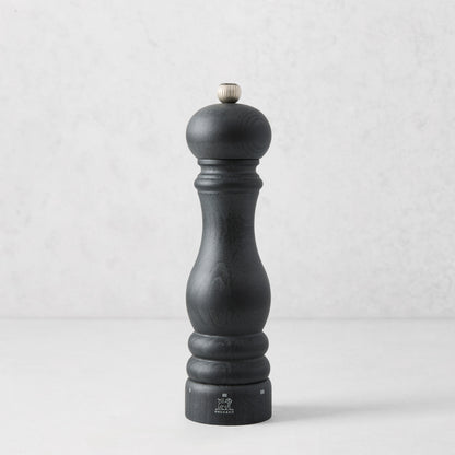 9-inch Peugeot Paris pepper mill in matte black wood with a stainless steel adjustment knob.