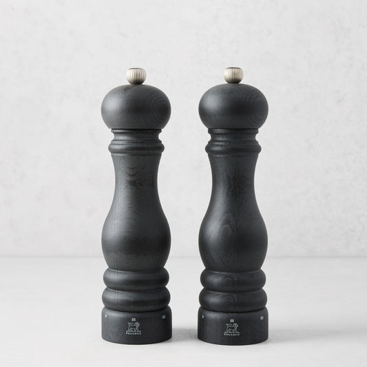 Peugeot Paris Matte Black 9" wood salt and pepper mills set with silver top knobs.