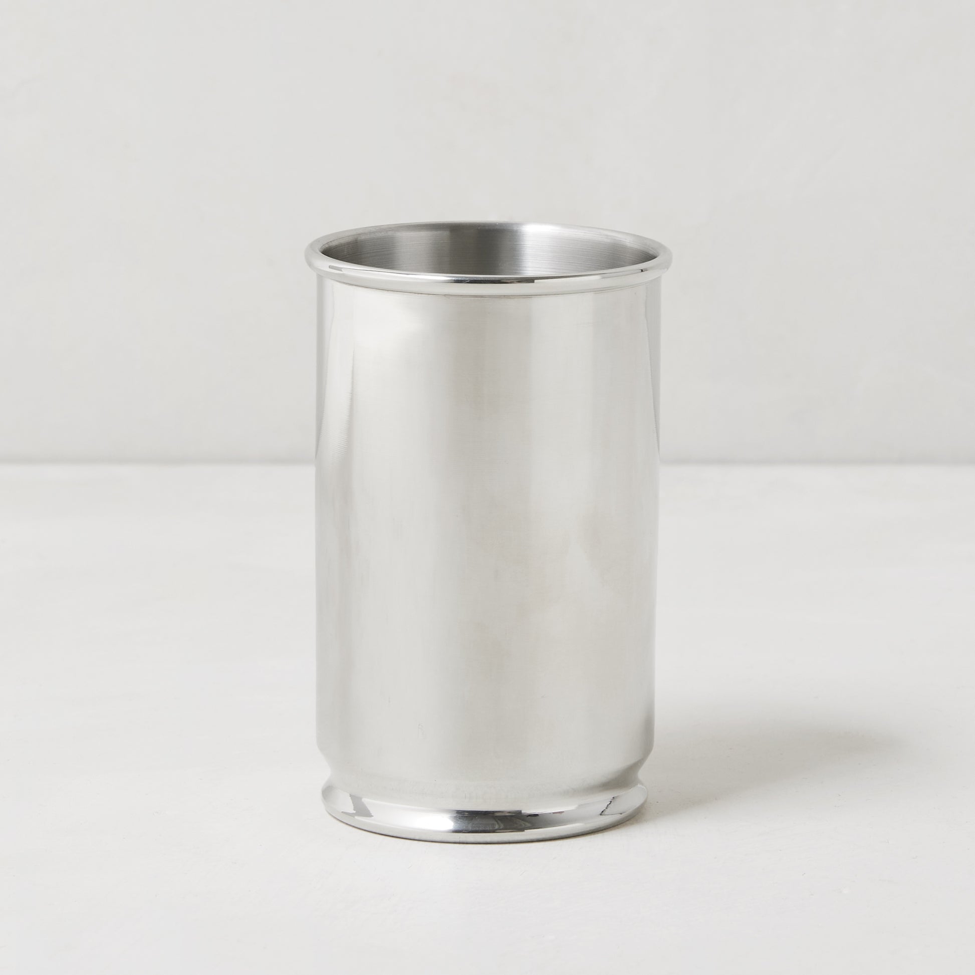 Silver pewter Tabasco holder, 3.5"H x 2", designed for 5oz bottle, with a sleek, polished finish.