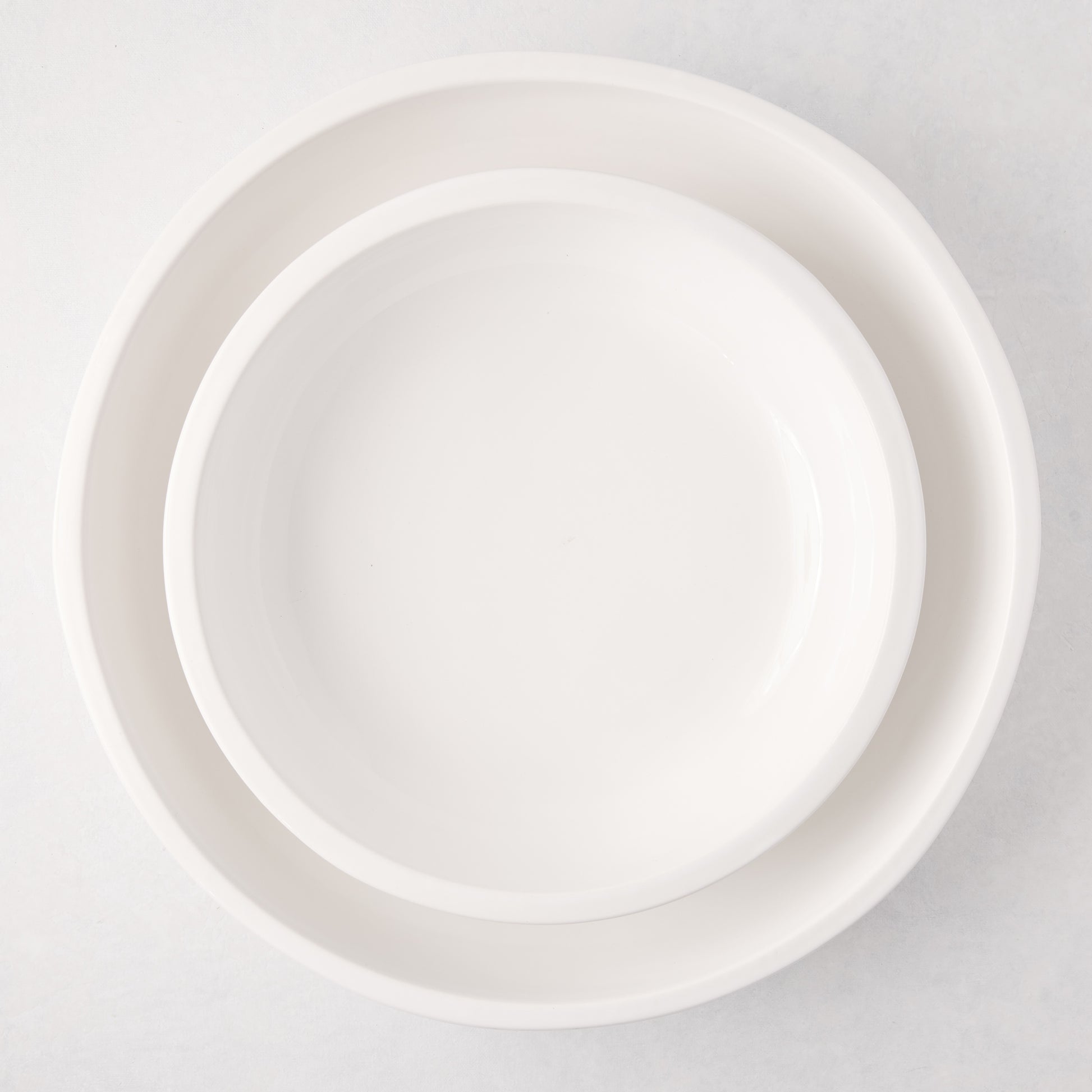 Large white ceramic Piatto Riso serve bowl, 15" diameter, with a smaller bowl nested inside.