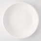 Large, round, white ceramic Piatto Riso serve bowl with a smooth, glazed finish.