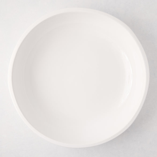 Large, round, white ceramic Piatto Riso serve bowl with a smooth, glazed finish.