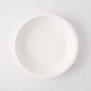 White ceramic Piatto Riso Small Serve Bowl, 11.75"Dia x 3"H, with a simple, sleek design.