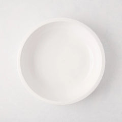 White ceramic Piatto Riso Small Serve Bowl, 11.75"Dia x 3"H, with a simple, sleek design.