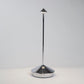 Pina Pro glossy chrome rechargeable LED lamp with a conical base and thin rod, emitting light from a small shade.