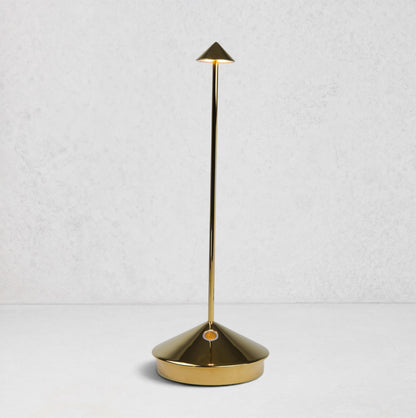 Pina Pro Glossy Gold rechargeable LED lamp with a conical base, thin rod, and triangular shade.