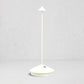 White die-cast aluminum Pina Pro rechargeable LED table lamp with a broad base and thin rod.
