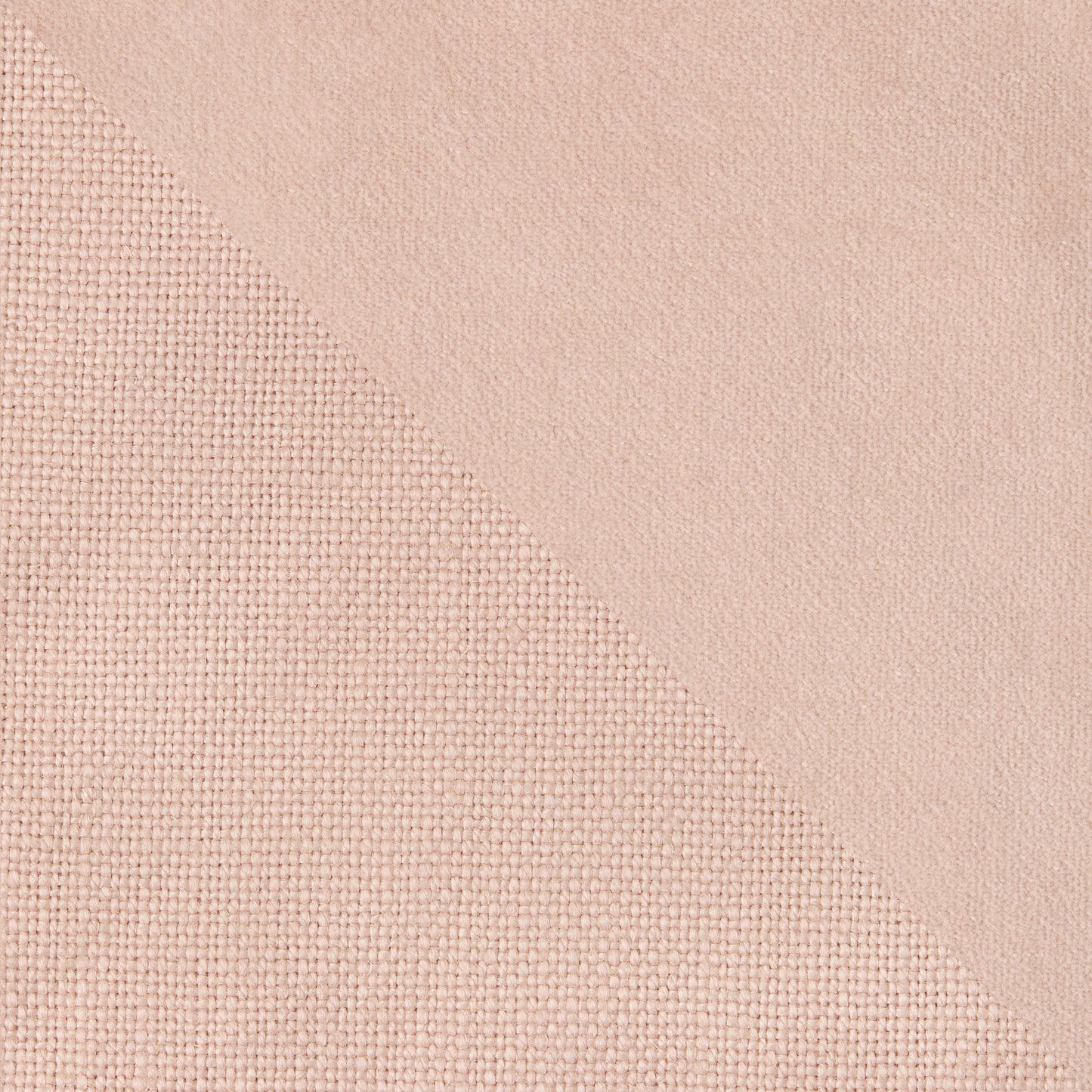 Pink linen and velvet reversible pillow, 22" square, with visible fabric textures.