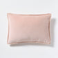 Pink linen and velvet reversible lumbar pillow, 20"L x 14"H, with hidden zipper and down insert.