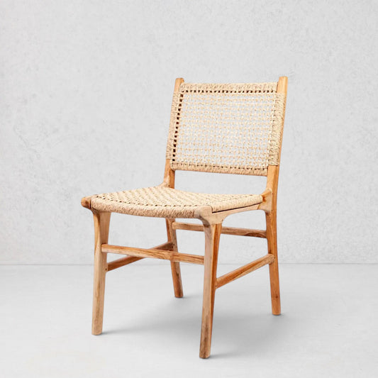 Playa Dining Chair with natural wood frame and woven rattan seat and back.