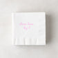 White 3-ply paper cocktail napkin with "please leave by 9" in pink script, 5.5" square.