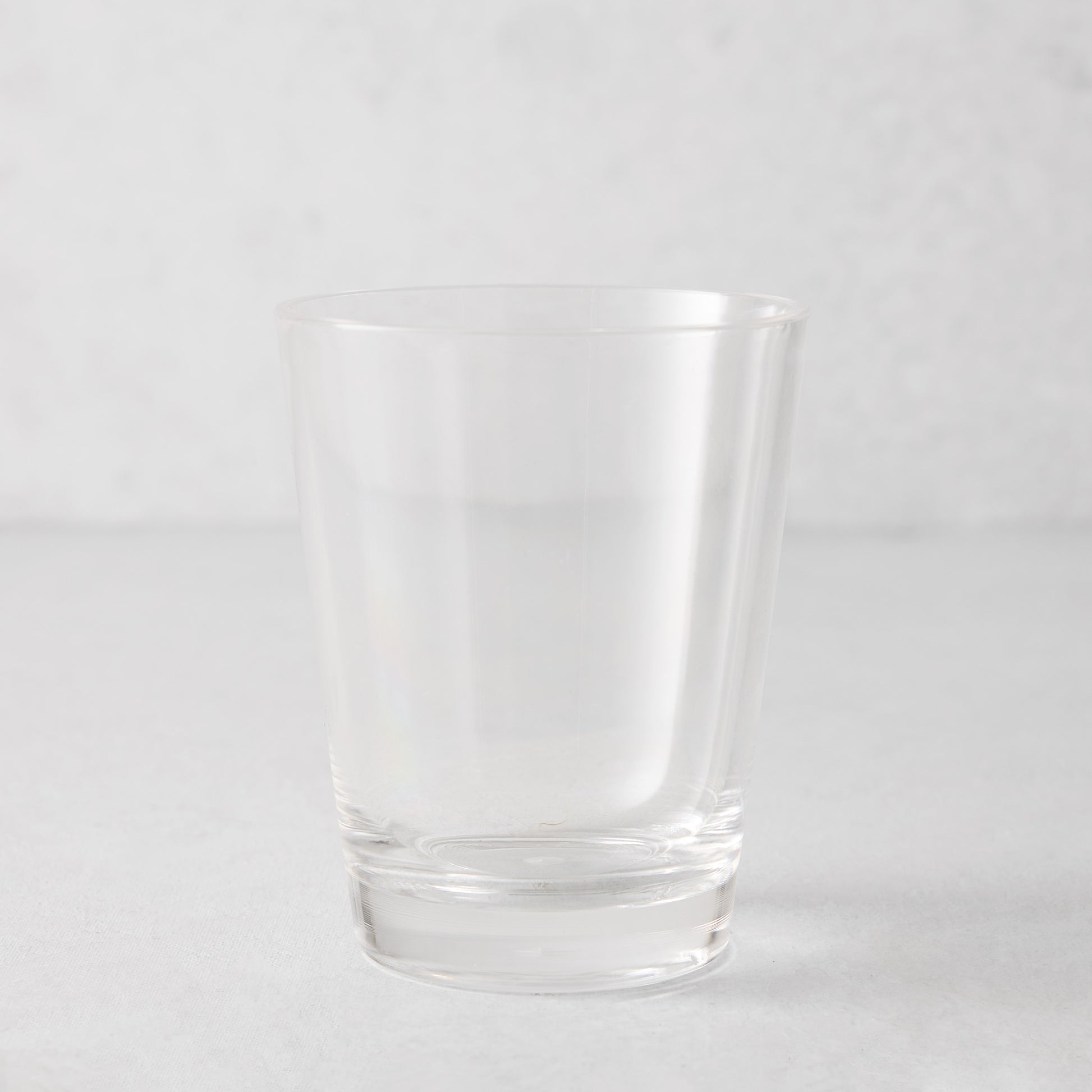 Clear acrylic double old-fashioned glass, 14oz, with a sturdy bottom and smooth lip.