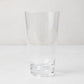 Clear acrylic high ball glass, 19oz, with a sturdy bottom and smooth lip.