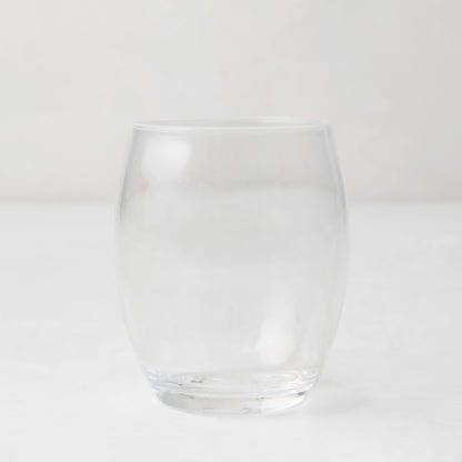 Clear 18oz Poolside Acrylic Stemless Wine Glass with a sturdy bottom and smooth lip.