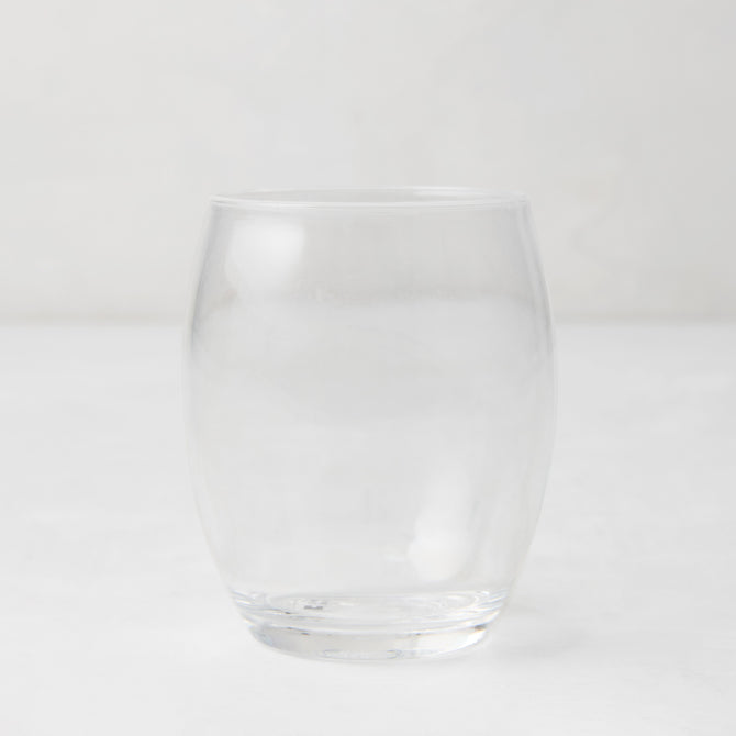 Clear 18oz Poolside Acrylic Stemless Wine Glass with a sturdy bottom and smooth lip.