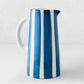 Portofino Blue Stripe Large Ceramic Pitcher, white glaze with hand-painted blue vertical stripes, curved handle.