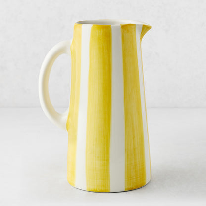 Portofino Yellow Stripe Large Ceramic Pitcher, white with hand-painted yellow vertical stripes, curved handle and spout.