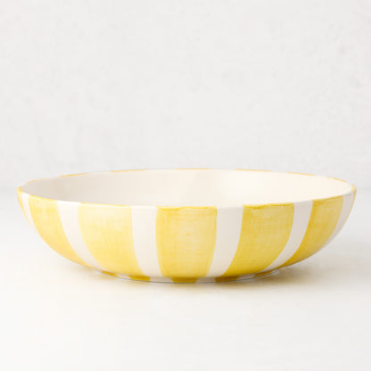 Portofino Yellow Stripe Large Ceramic Serve Bowl, hand-painted yellow and white vertical stripes.