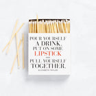 White boxed matches with "Pour Yourself a Drink, Put on Some Lipstick..." quote, featuring long natural wood sticks.
