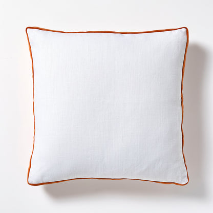 White Belgian Linen 22" square pillow with pumpkin orange velvet gusseted trim.