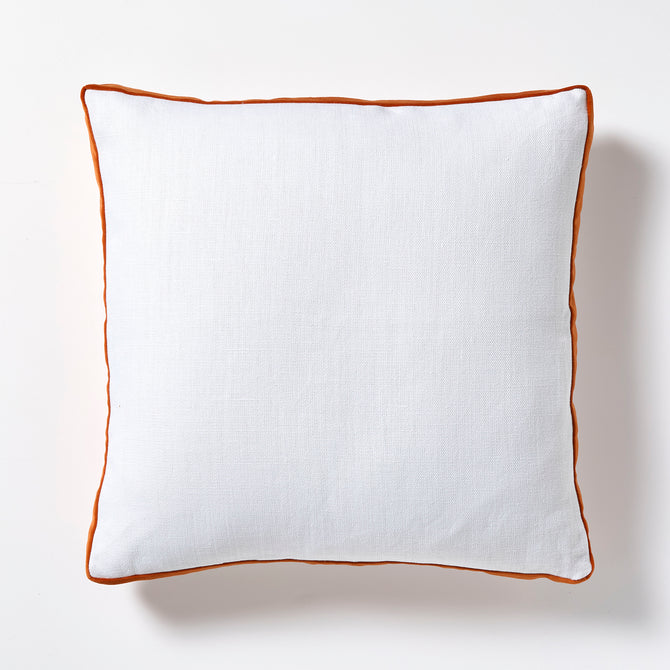 White Belgian Linen 22" square pillow with pumpkin orange velvet gusseted trim.