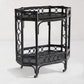 Raelyn Black Rattan Bar Cart with two shelves, dark wood, and smooth-rolling casters.