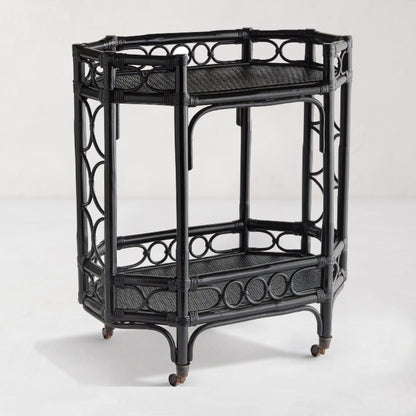Raelyn Black Rattan Bar Cart with two shelves, dark wood, and smooth-rolling casters.