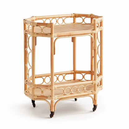 Natural rattan Raelyn Bar Cart with two woven shelves, decorative sides, and casters.