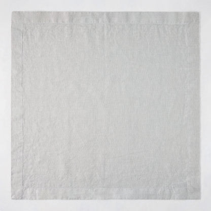 Rain HG Signature hand-dyed light grey linen napkin, 22-inch square with mitered corners.