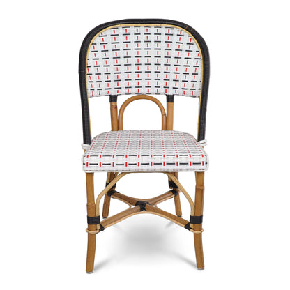 Rattan bistro chair with natural frame, black trim, and woven white, black, red pattern on seat and back.