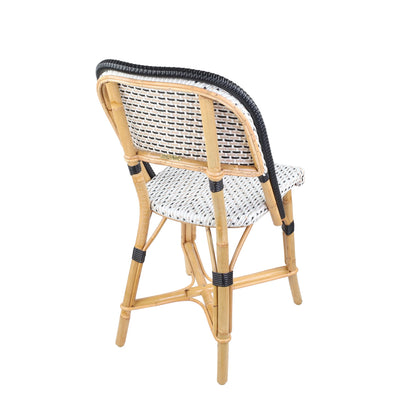 Rattan Chambord Bistro Chair, black and white polka dot woven rattan, natural wood frame, black border.