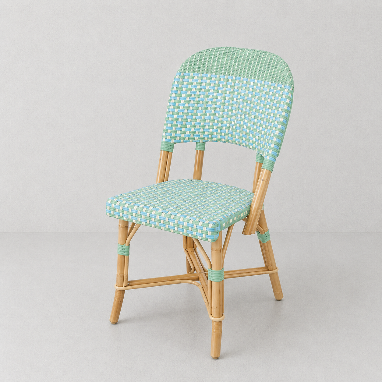 Rattan Chenonceau Blue and Green Bistro Chair with woven rattan seat and back, and wooden frame.